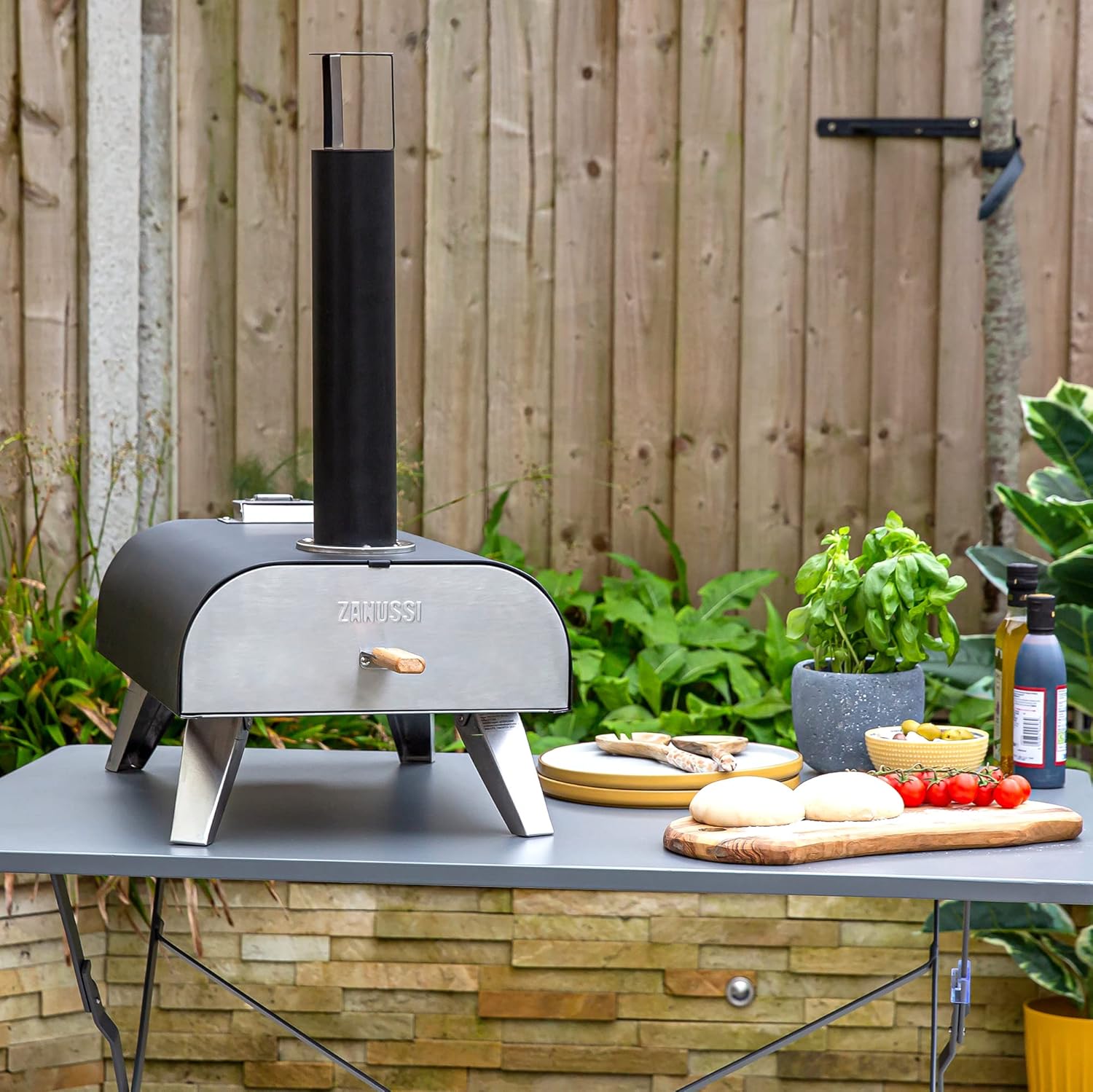 Zanussi ZPO1BPC Outdoor 12 Inch Wood Pellet Portable Wood Fired Pizza Oven with Paddle and Cover in Black, BBQ Oven & Smoker, Stainless Steel Foldable Legs - Image 10